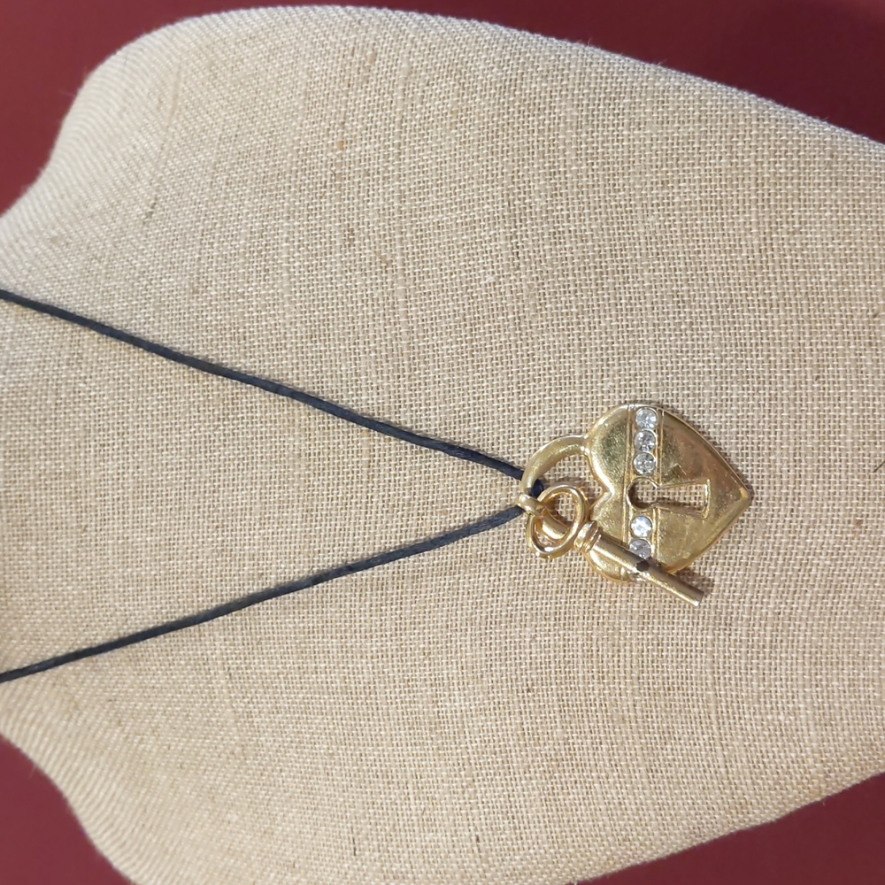 4 for $20 Fashion Jewelry Avon Gold Toned Heart Shaped Locket Key Black String
